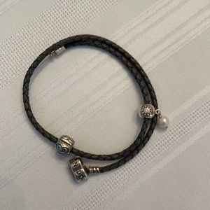 Pandora gray braided leather wrap bracelet with 2 silver charms.  14 1/2 inch